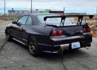 1995 Nissan R33 GTR V Spec – Iconic JDM Performance Machine